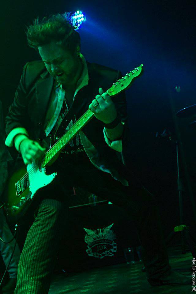 John Kent playing guitar